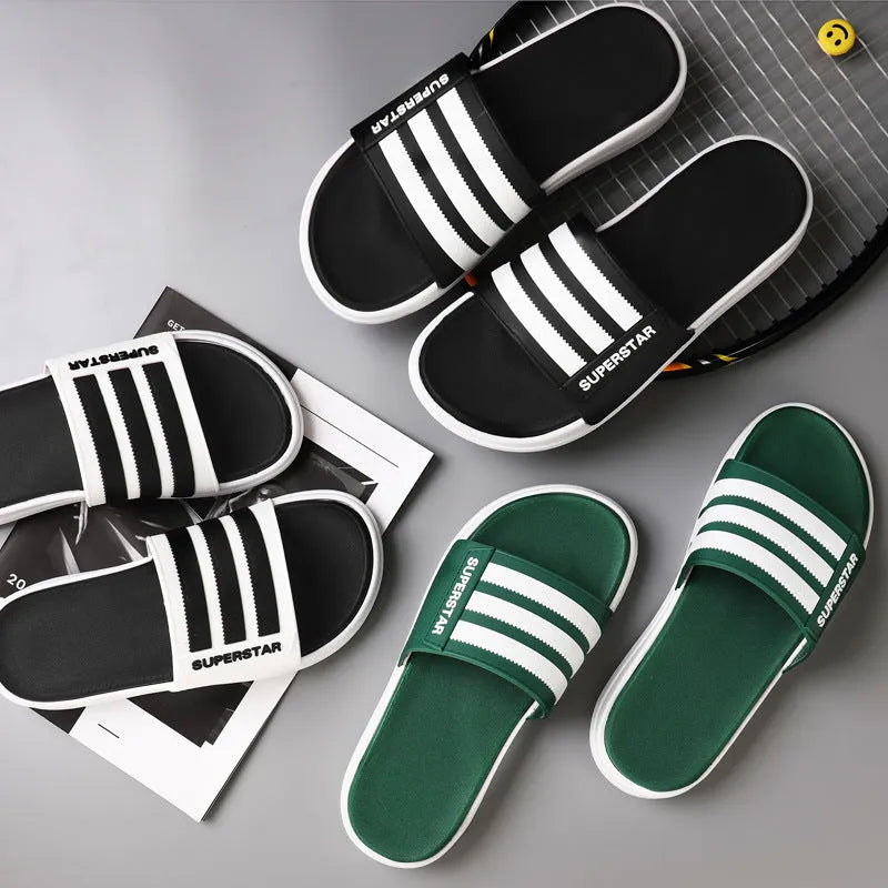Non-slip bathroom slippers in black green and white with rubber outsole