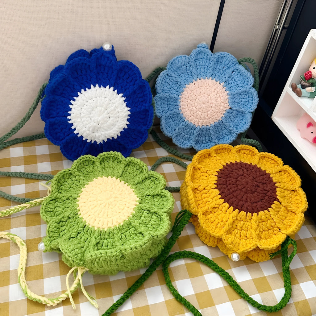 Hand-woven round bag with crocheted flowers, cotton lining, and internal phone pocket in four colour options
