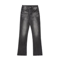 Men's black washed denim jeans on a flat surface showing full leg and pocket details