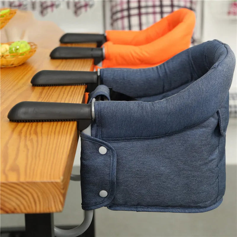 Portable baby high chair dining seat with safety belt folded and unfolded