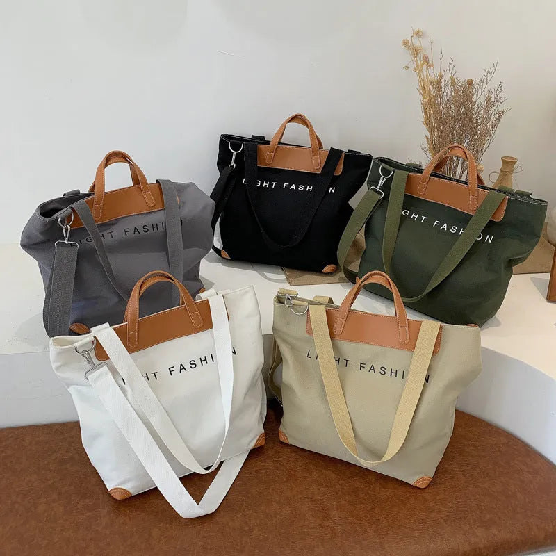 Canvas shoulder bag for women with letter print, large capacity, available in black, grey, white, khaki, and green colours
