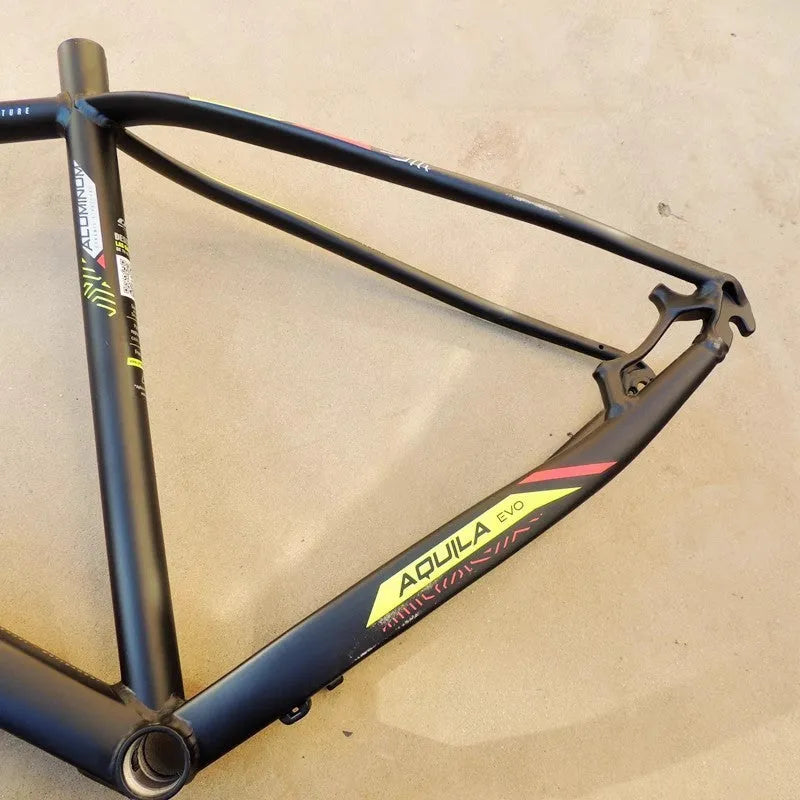 Black green aluminium mountain bike frame with internal cable routing and disc brake mounts