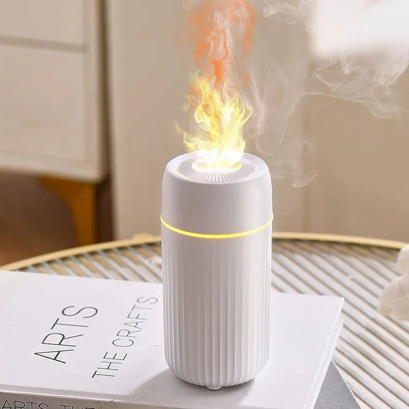 Black car aroma diffuser with flame simulation effect on a car dashboard