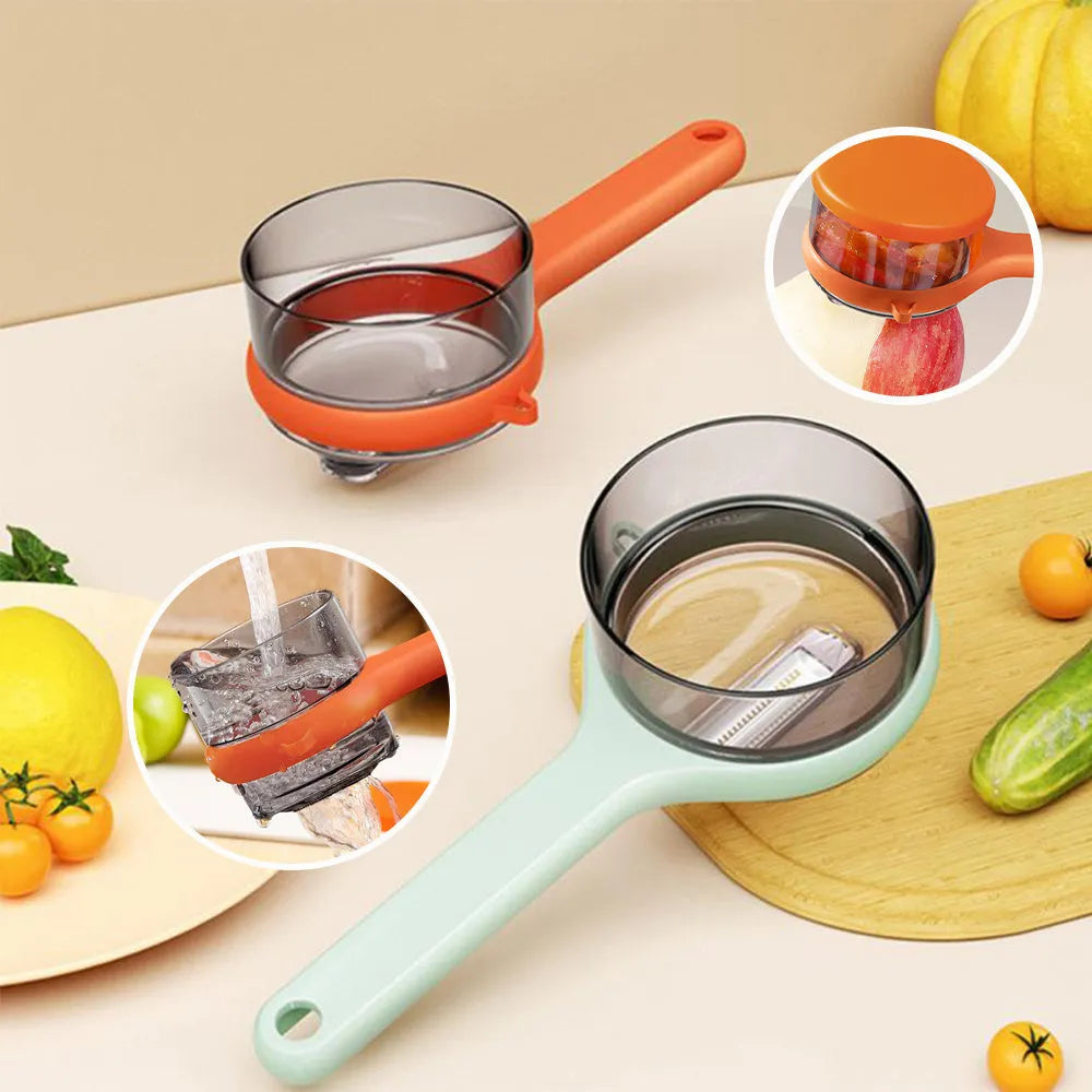 Light green kitchen peeler with a small orange storage bucket attached underneath the blade.