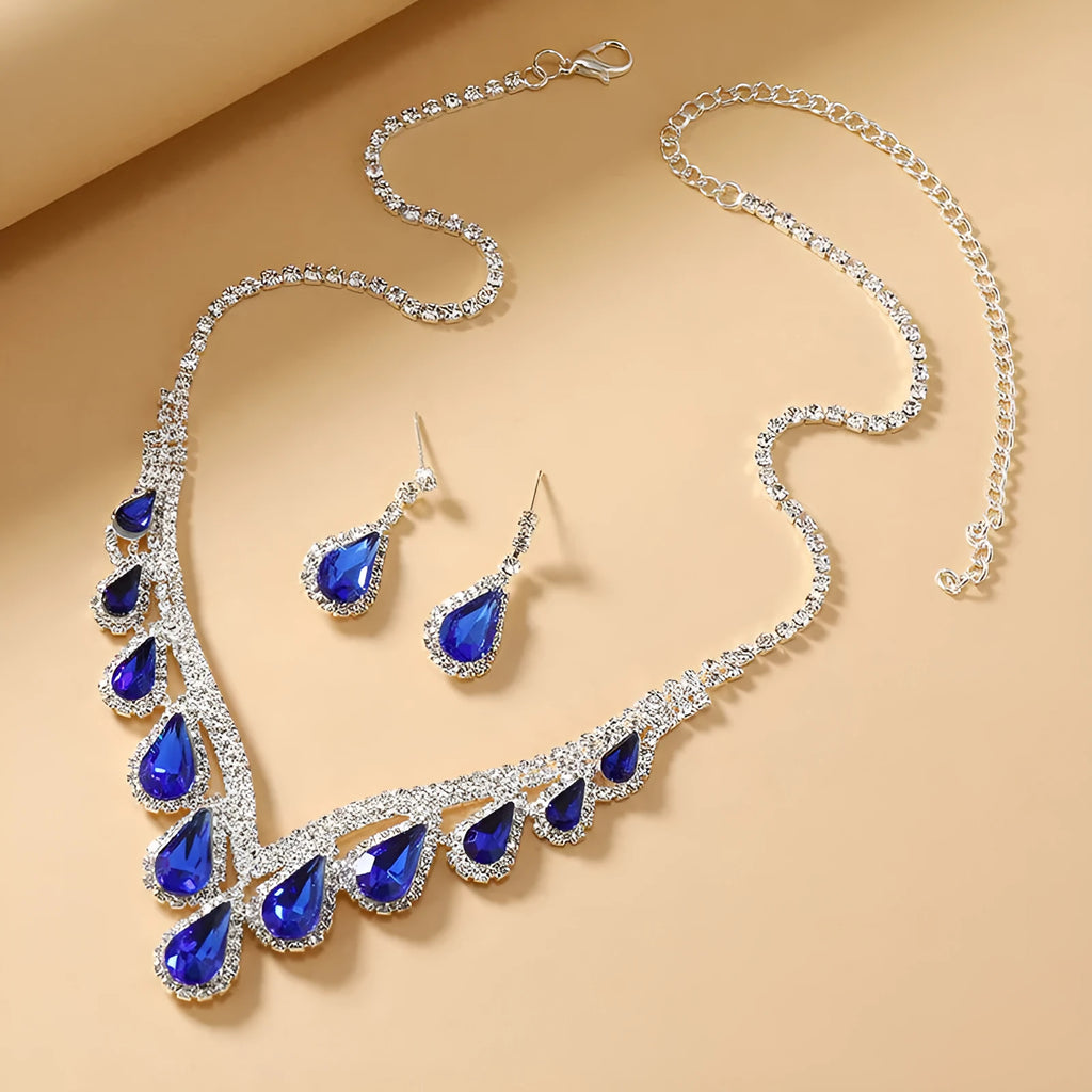 Sapphire blue alloy clavicle chain necklace and earrings set in Royal Blue White K finish on display
