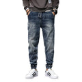 Men's plus size velvet stretch jeans in blue with slim fit and tether closure