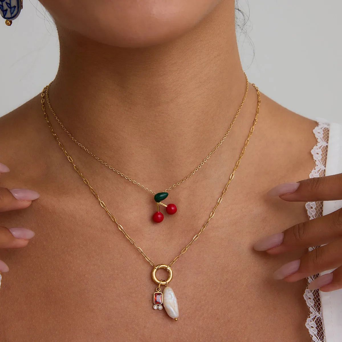 Stainless steel fruit-shaped pearl necklace with cherry pendant for women, light luxury style
