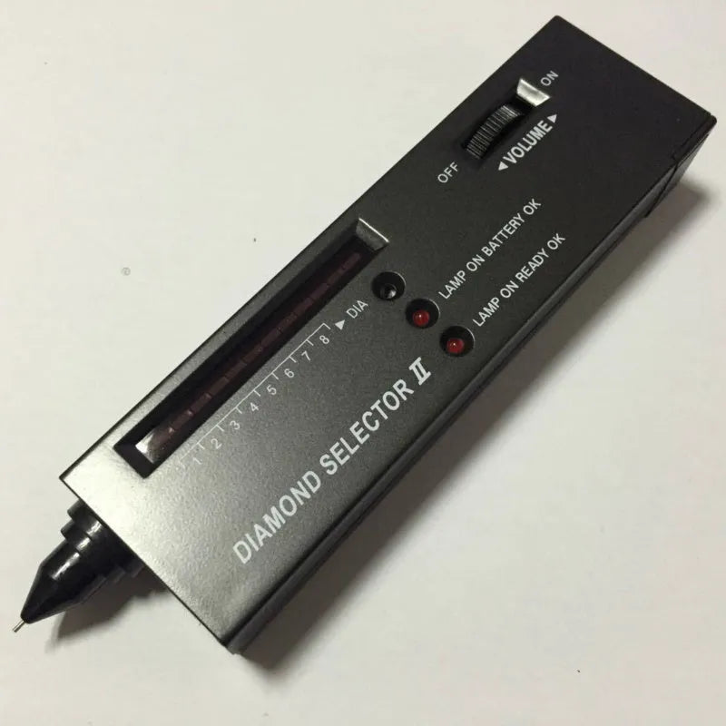 Second generation portable diamond thermal conductivity tester with metal probe on black background