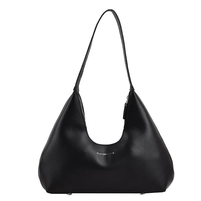 Women's retro pillow-shaped shoulder handbag in brown with sandwich pocket exterior and internal organisation