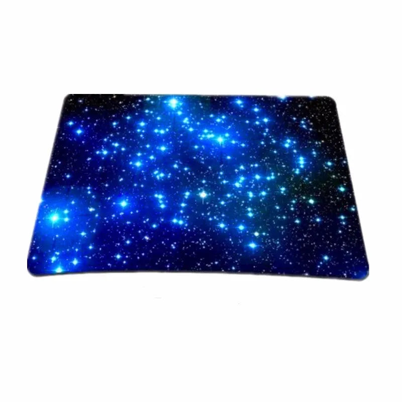 Blue star mouse pad with high-density fabric surface and anti-skid rubber base on a desk