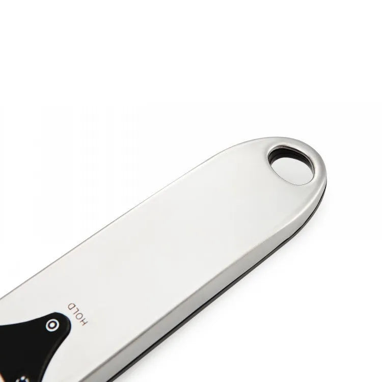 Smart digital measuring spoon with built-in electronic scale showing 0-30ml volume capacity