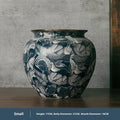 New Chinese retro artistic ceramic vase with dried flowers on a tabletop in a home living room setting