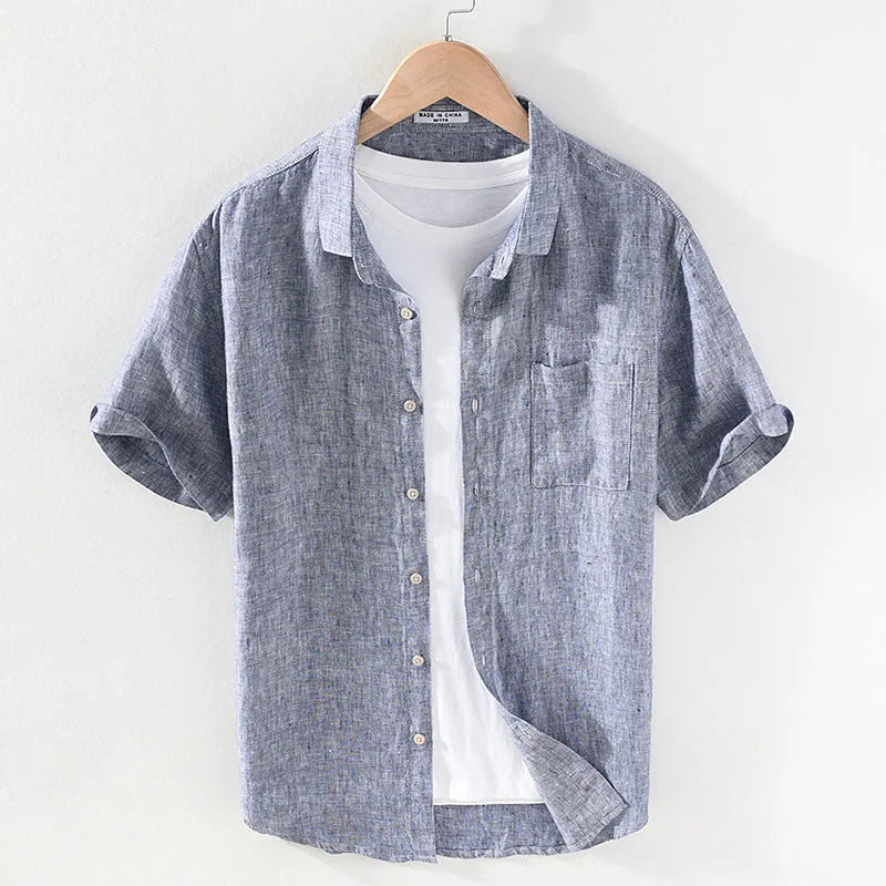Men's light grey linen short sleeve shirt with a square collar, laid flat.