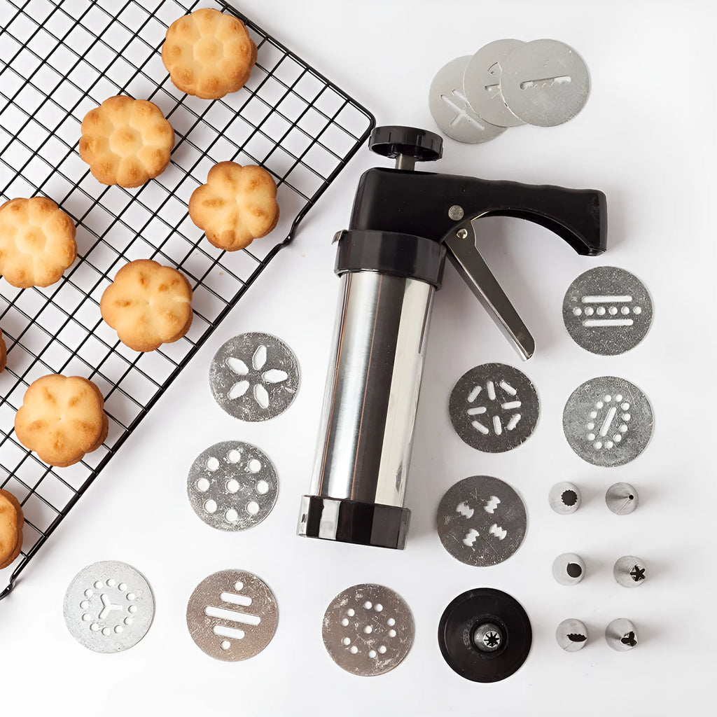 Stainless steel biscuit press with 13 moulds and 8 piping nozzles in a colour gift box