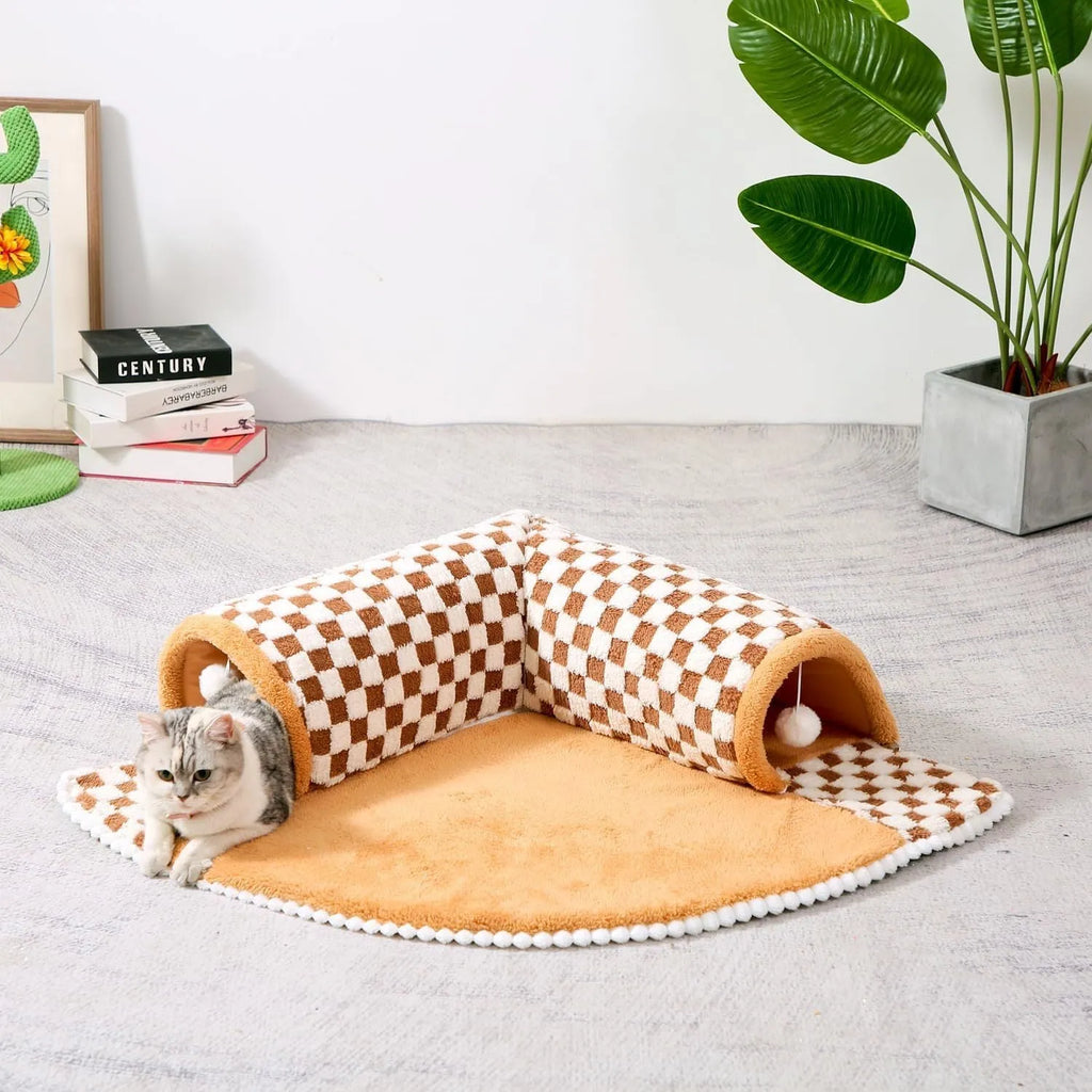 Fan-shaped plush pet bed for dogs and cats with a central tunnel, shown in a yellow colour.