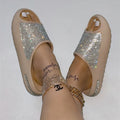 Women's rhinestone slippers with peep-toe thick sole in apricot, side view showing rhinestone upper and EVA sole