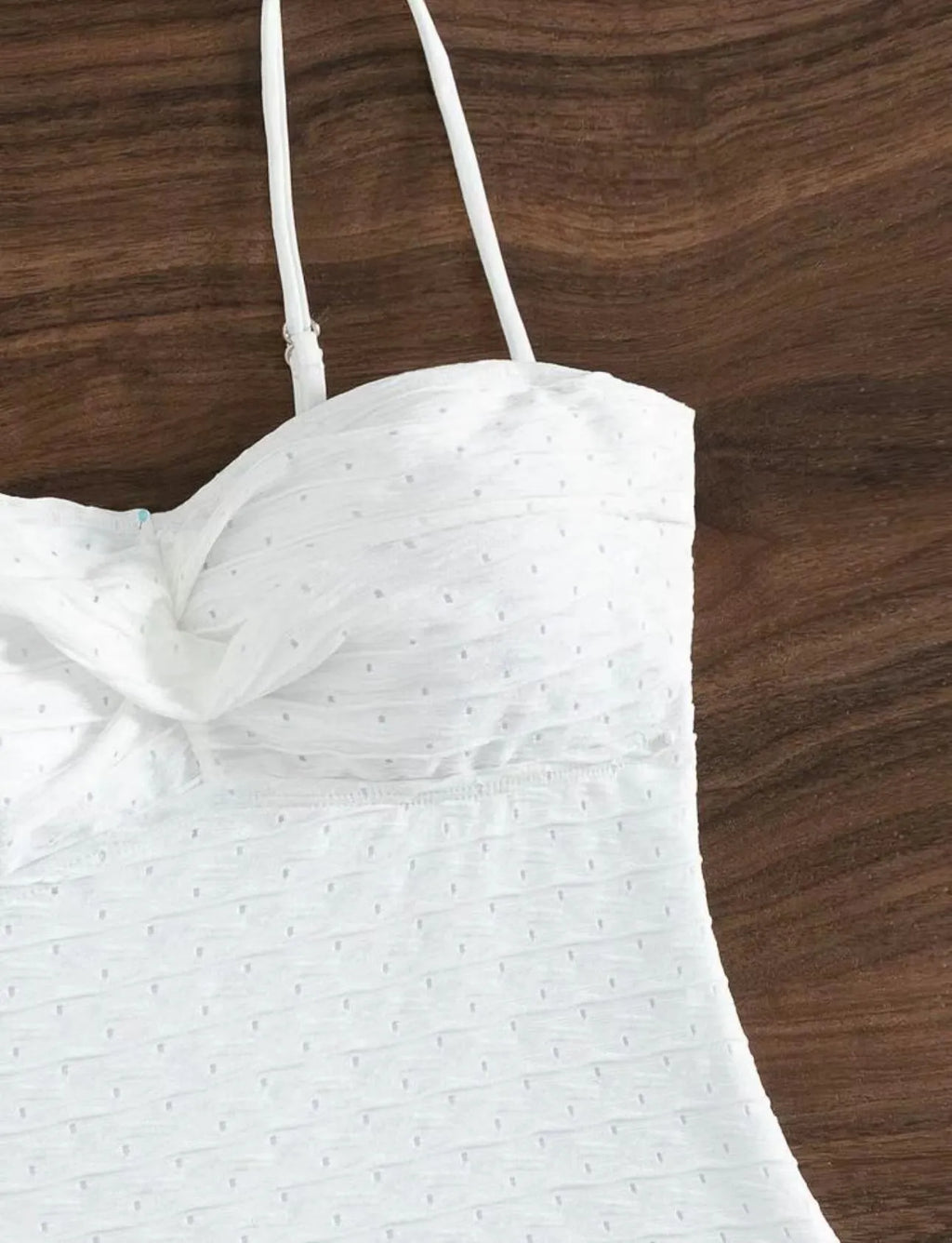 White women's one-piece swimsuit with sling brief style and quick-drying polyester fabric