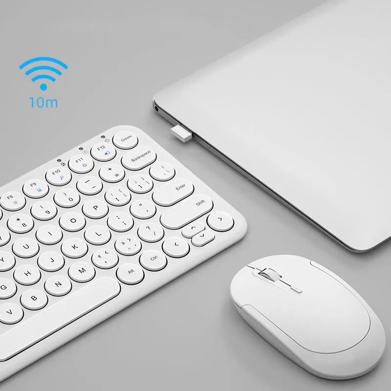 Mute brand ultra-thin wireless keyboard and mouse set with USB receiver on a wooden desk.