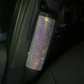 Four piece car interior accessory set with rhinestone crystals, including steering wheel, gear shift, handbrake and seat belt covers