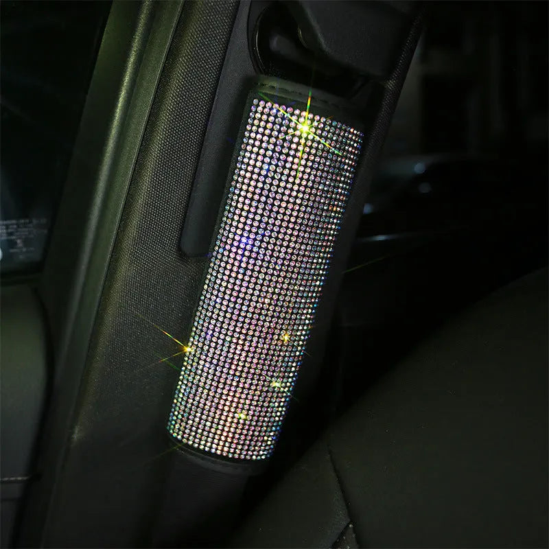 Four piece car interior accessory set with rhinestone crystals, including steering wheel, gear shift, handbrake and seat belt covers