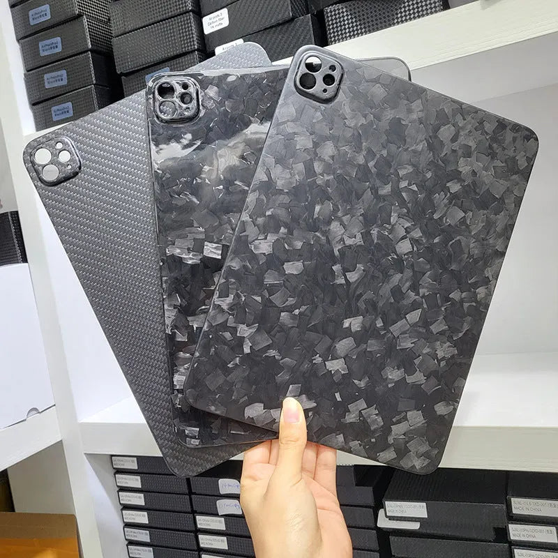 Carbon fibre hard protective case for iPad Pro 11 showing plaid weave pattern in a choice of three finishes.