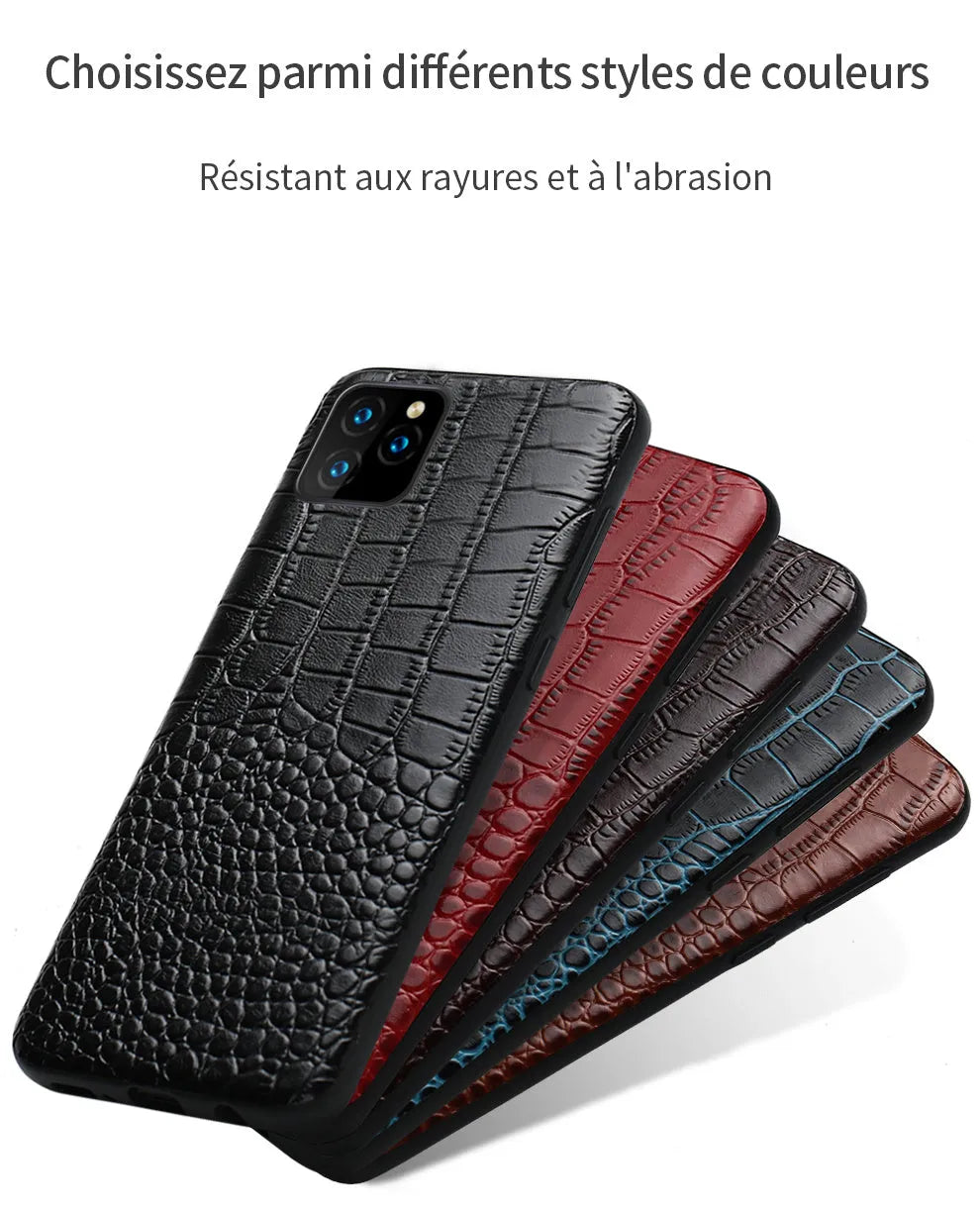 Black leather iPhone case with a crocodile pattern texture, shown fitted on a compatible phone.