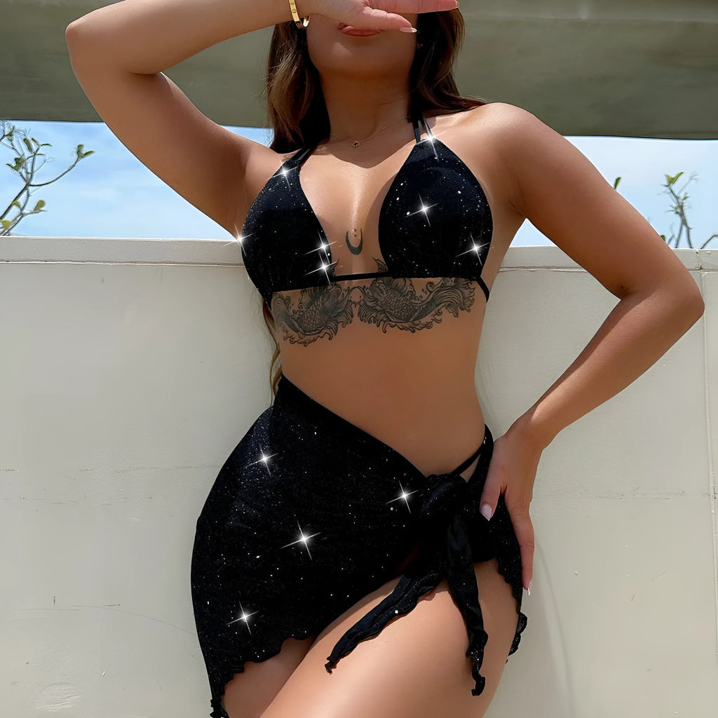 Black three-piece bikini swimsuit set with matching top and shorts on white background
