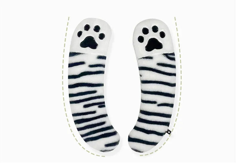 Plush toilet seat cushion with adhesive Velcro fastener in black and white stripes for bathroom use