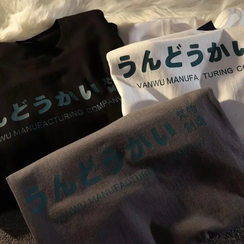 Loose fit cotton t-shirt in black, white or dark grey colours on hanger