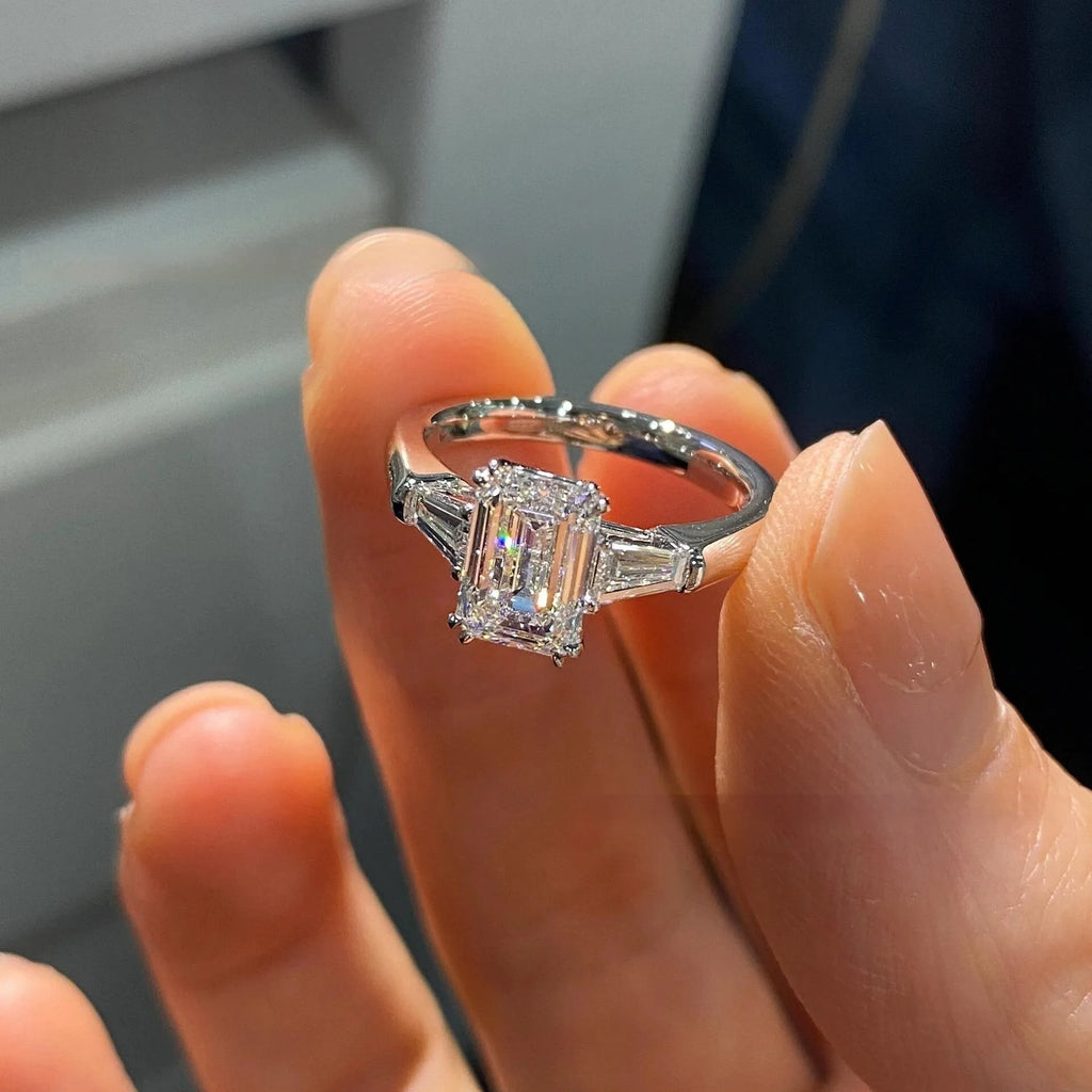 New Seiko Small Sugar Cube Ring women's simple design V GOLD square ring on a plain background