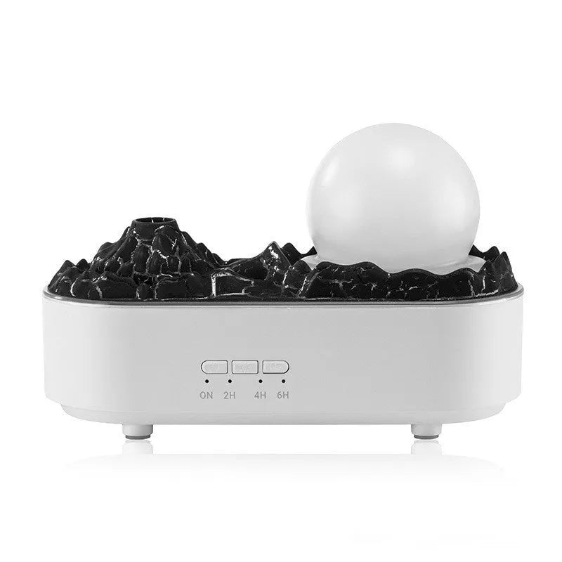 White volcano-shaped desktop humidifier with USB cable