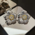 Textured gardenia stud earrings in E3002 two-tone colour with copper construction