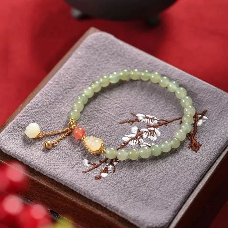 Qingshui jade women's bracelet with gold plated 6mm beads and Chinese fu character
