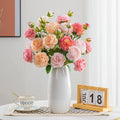 Fake flower decoration silk bouquet in eight mixed colours on a living room shelf
