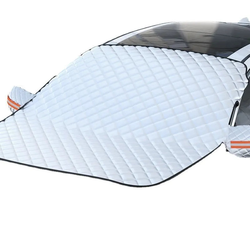 Large aluminium foil winter car cover with reflective stripes and magnets for SUV frost protection.