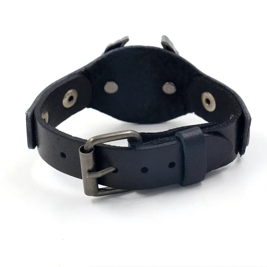 Black leather bracelet with a geometric alloy eagle watch-buttom decoration.