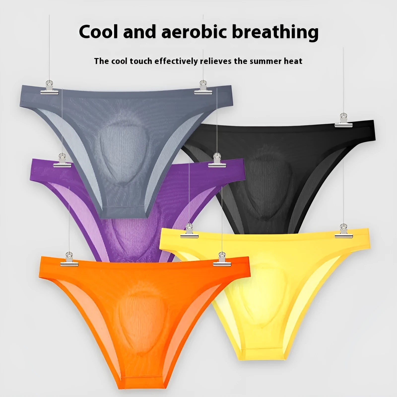 A pair of seamless ultra-thin ice silk women's briefs in a solid colour, laid flat to show the low-waist design.