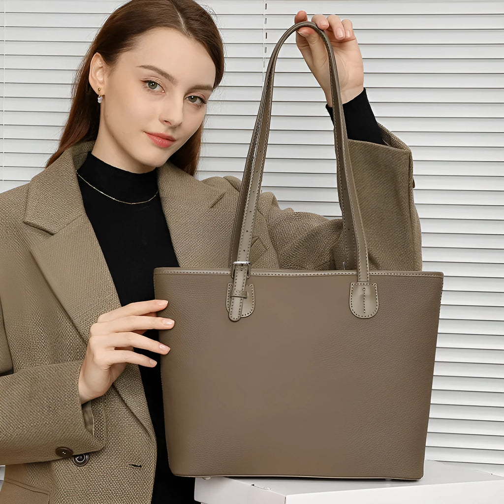 Genuine leather retro women's tote bag in horizontal square shape, showing internal zipper and phone pockets.