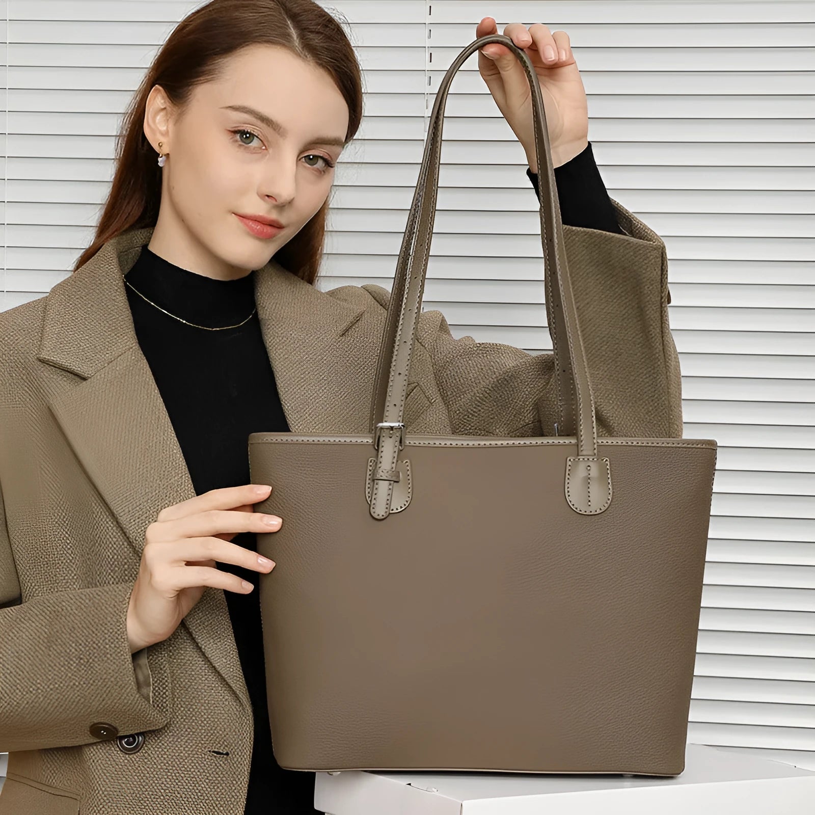 Genuine leather retro women's tote bag in horizontal square shape, showing internal zipper and phone pockets.