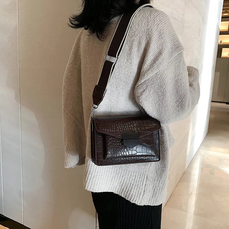 PU crossbody bag in four colours showing 20cm width and 14cm height