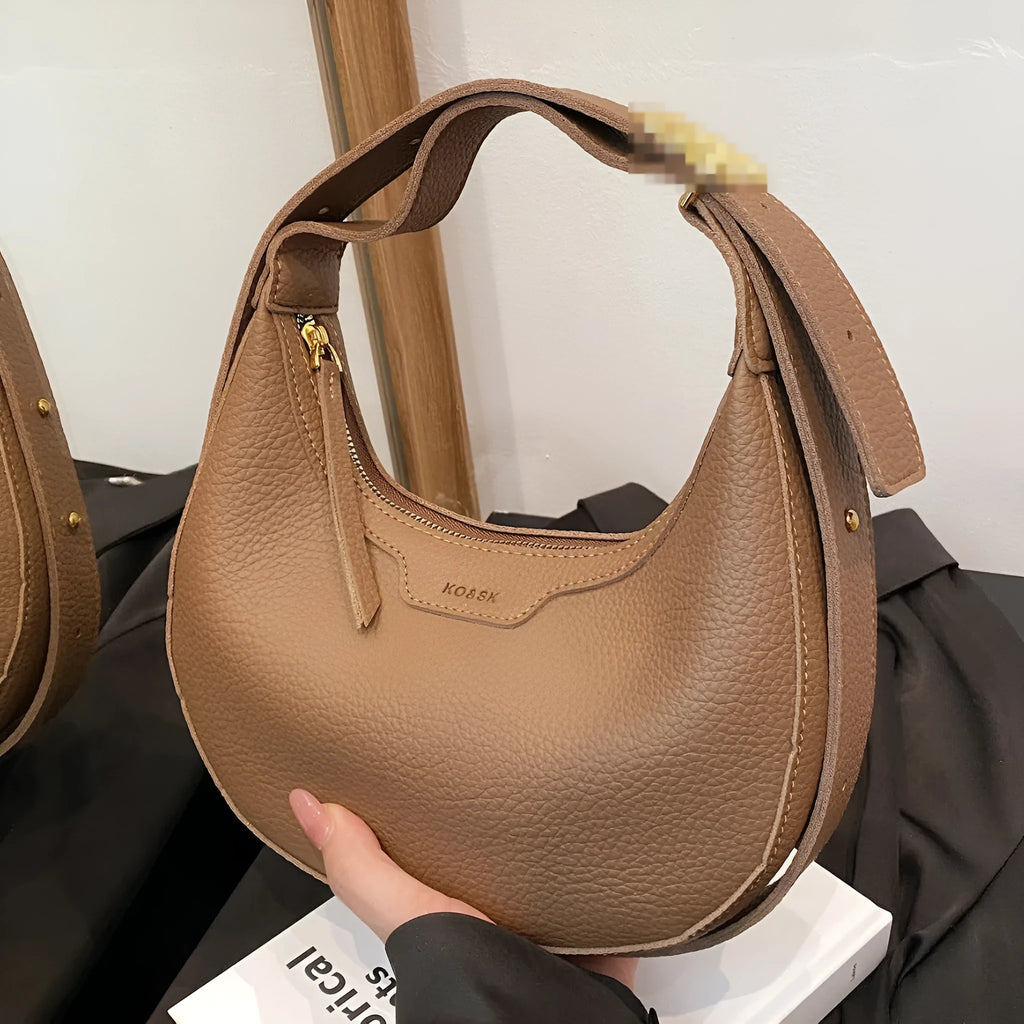 Women's one shoulder crossbody underarm handbag in PU, dumpling shape, 23cm wide, 120cm strap, black