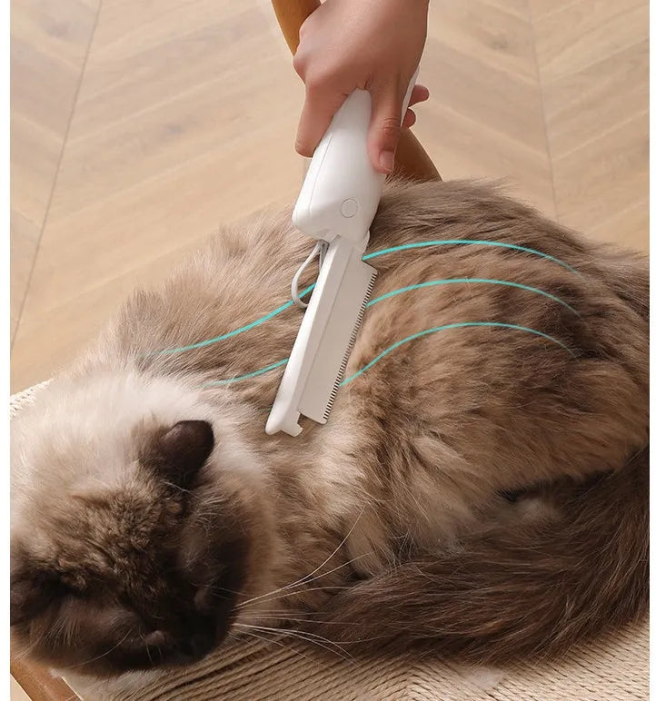 Pink and white plastic pet grooming brush for cats and dogs to remove floating hair