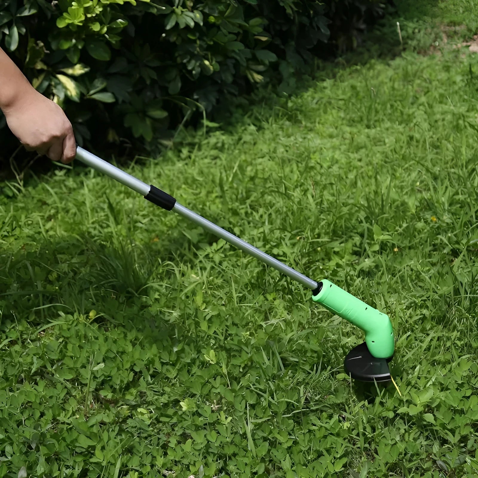 Cordless lawn trimmer with ABS nylon body, 37.5cm length, extension pole, and protective debris shield for garden weeding