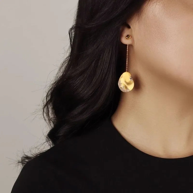 Asymmetric floral earrings with Chinese style design featuring zircon mosaic accents on gold-plated materials