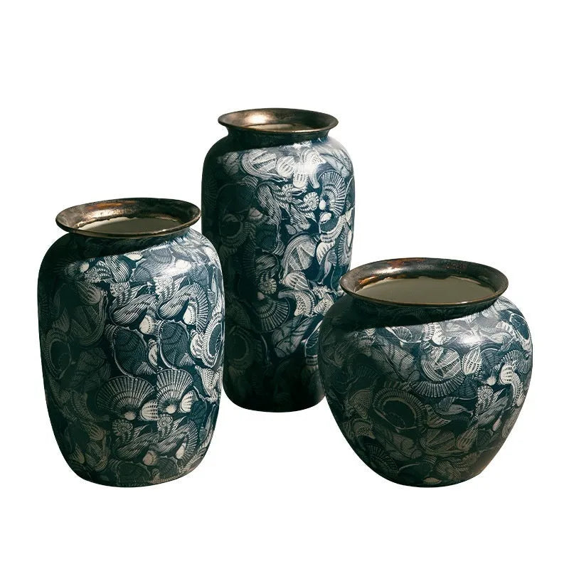 New Chinese retro artistic ceramic vase with dried flowers on a tabletop in a home living room setting