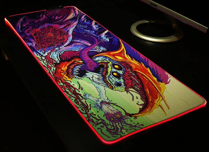 Symphony RGB light-emitting gaming mouse pad with cloth surface and rubber base, available in 300x600x4mm and 800x300x4mm sizes