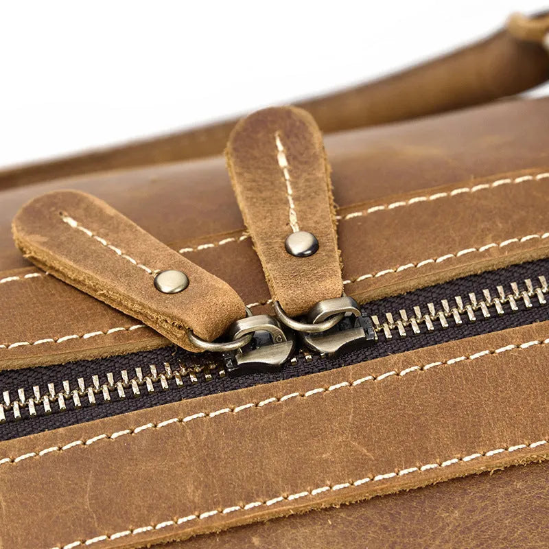 Genuine cowhide leather large capacity luggage bag in light brown with zipper closure and top handles