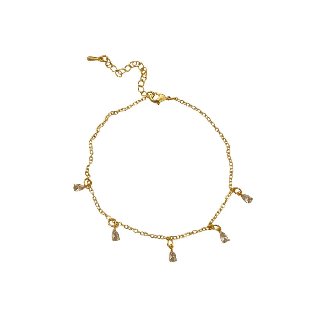 Zircon jewellery set with geometric necklace, matching earrings, and anklet.