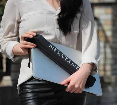 Black folding laptop computer stand with reinforced nylon construction showing folded position at 35.4cm length