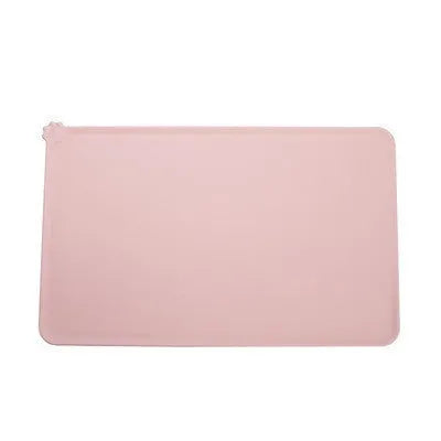 Silicone pet feeding placemat under a dog bowl, shown in one of five available colours.